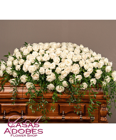 Casket spray with all white roses