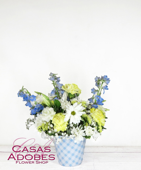 Blue Gingham Container with white daisies, yellow carnations, blue delphinium and baby's breath