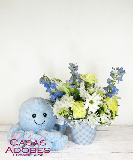 Blue Gingham Container with white daisies, yellow carnations, blue delphinium and baby's breath