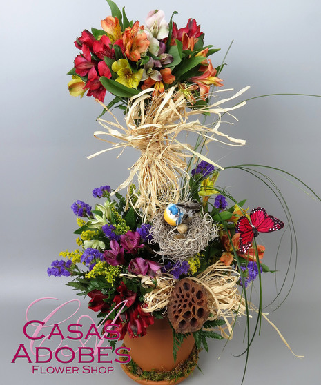 Topiary design with spring color alstroemeria lilies 