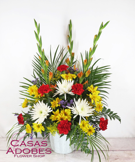 Tall and Traditional Sympathy Basket with Pastel Spring Colors