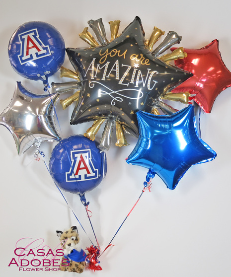 Congratuation and U of A themed mylars with a Wildcat plush