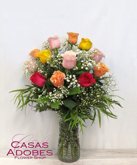 Dozen Assorted Colors of Roses in a Vase